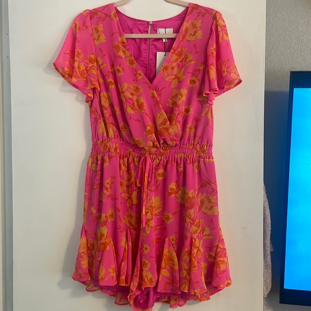 Cute and summery romper. Never worn.